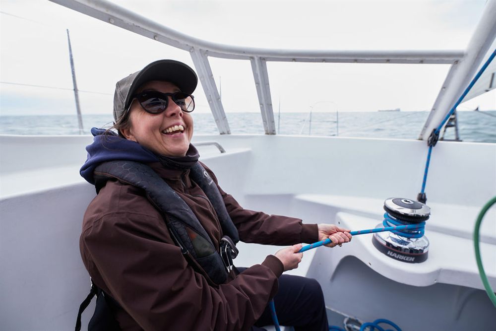 Sarah, who lives with Multiple Sclerosis, out on the water with the Disabled Sailors Association